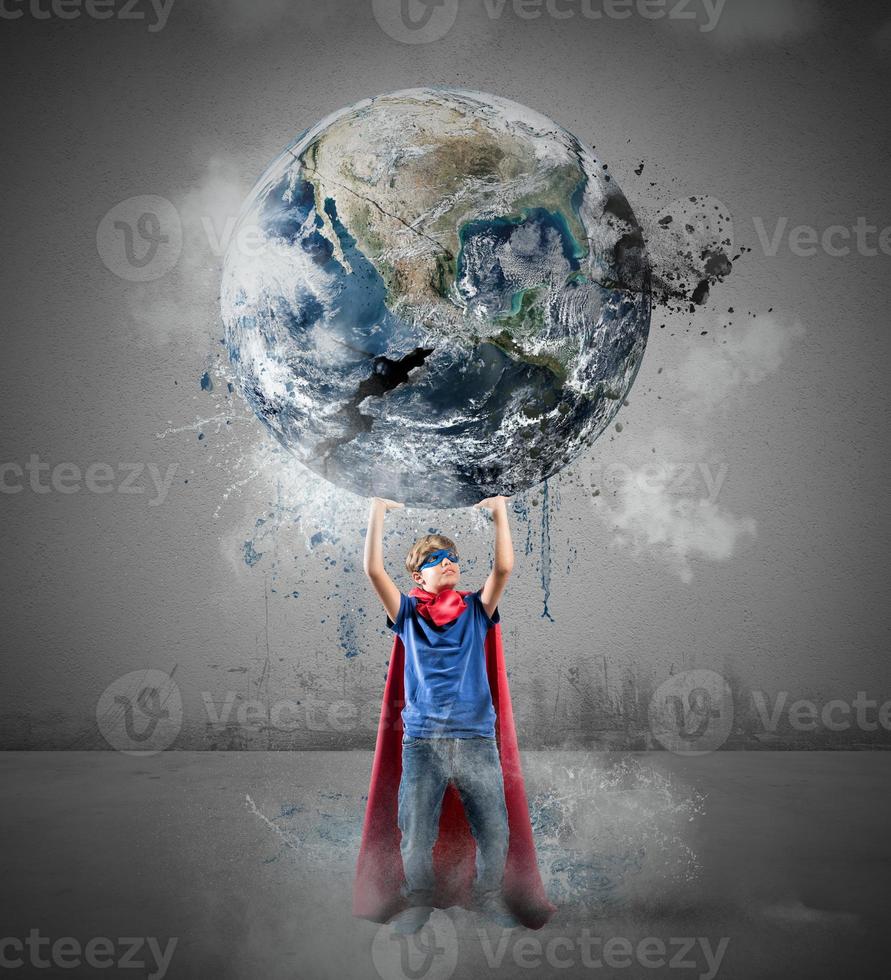 Little superhero saves the world photo