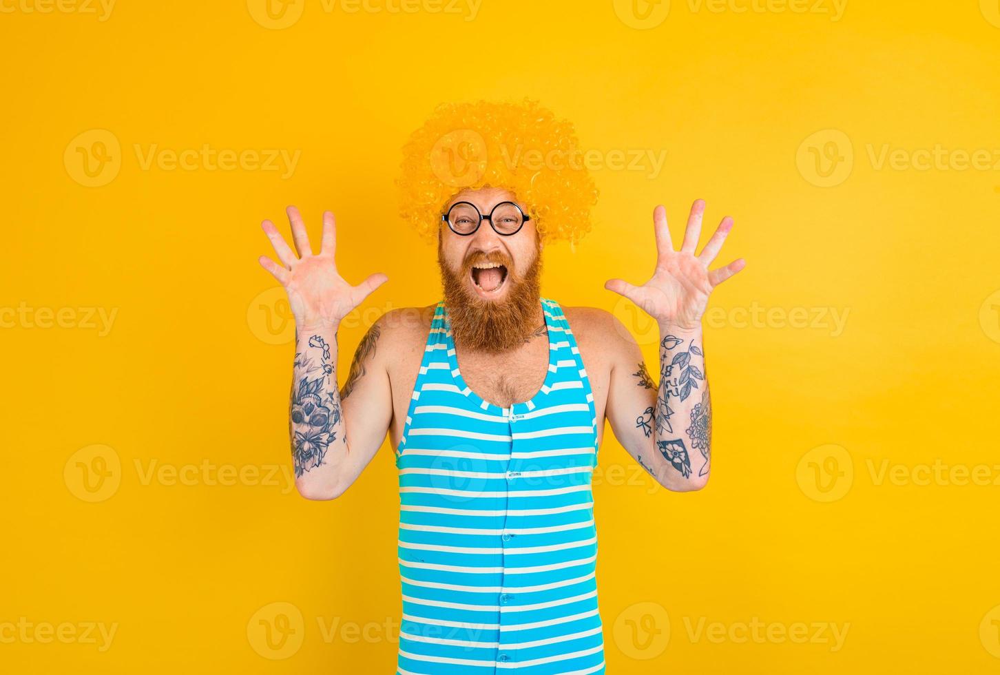 man with yellow beard,wig and glasses photo