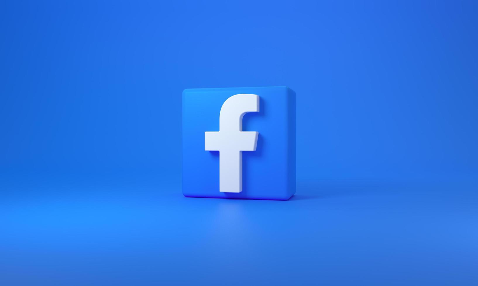 Cube with Facebook logo on blue background with space for text. Madrid, Spain, 2022 photo
