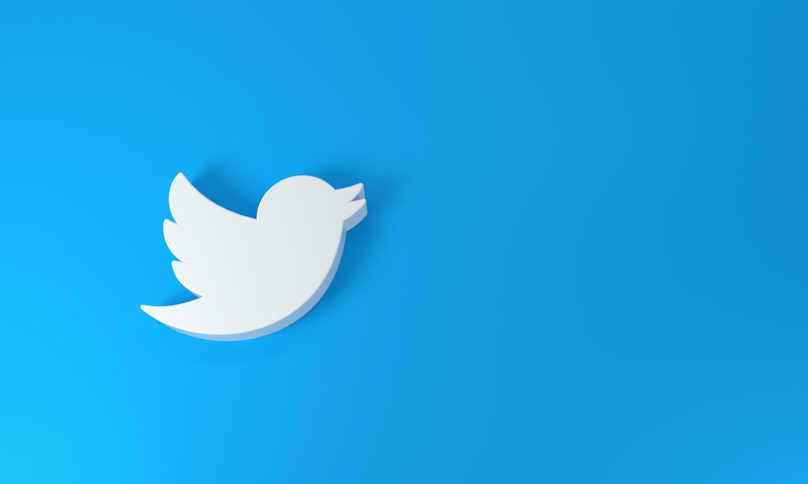 Twitter logo on blue background - top view. Madrid, Spain, 2022 photo