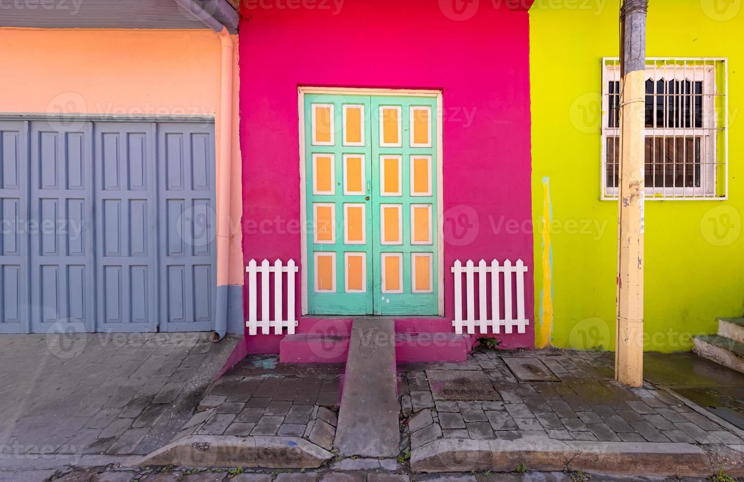 Colorful colonial architecture of historic center of Flores, Guatemala photo