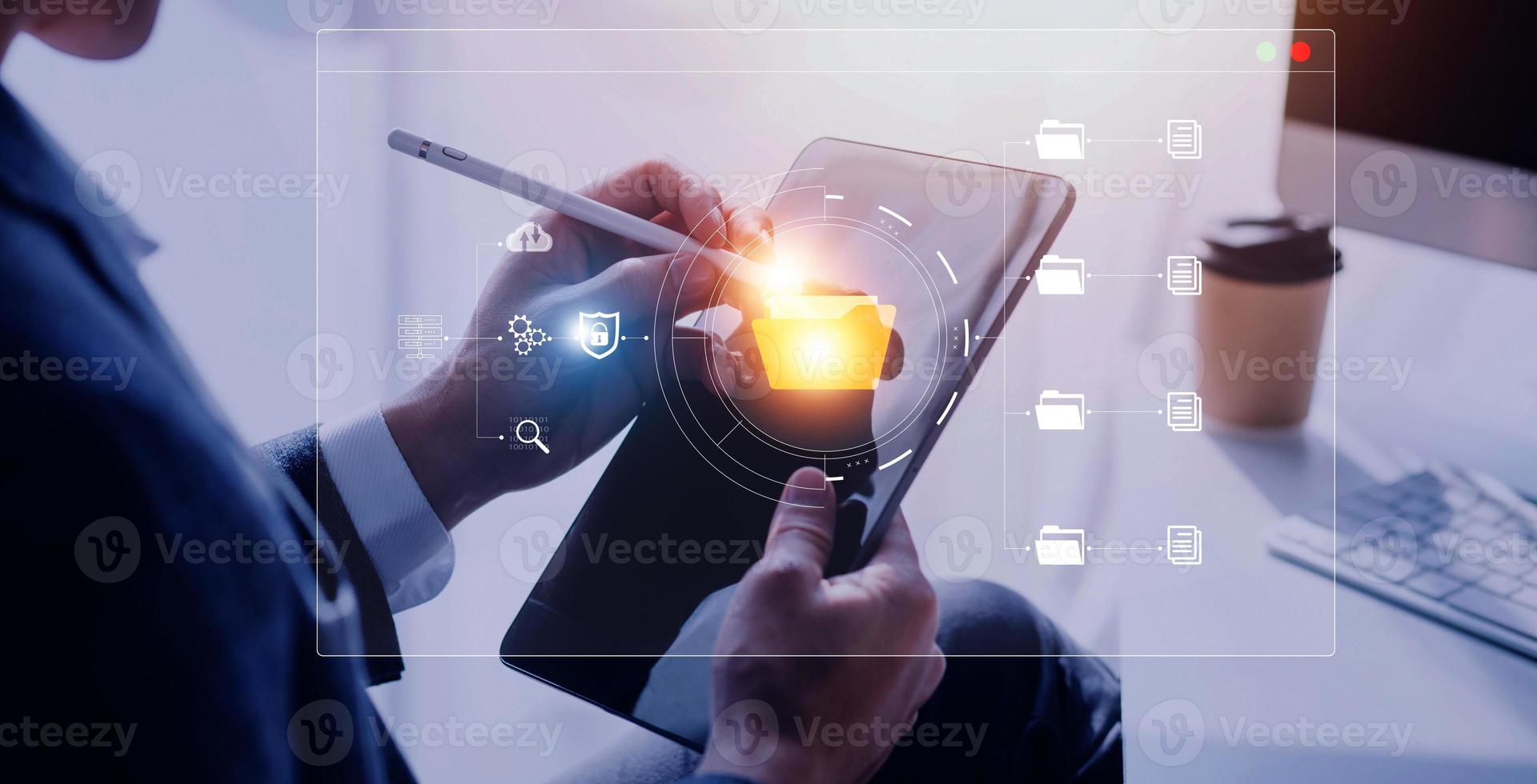 Document management system concept, business man holding folder and document icon software, searching and managing files online document database, for efficient archiving and company data. photo