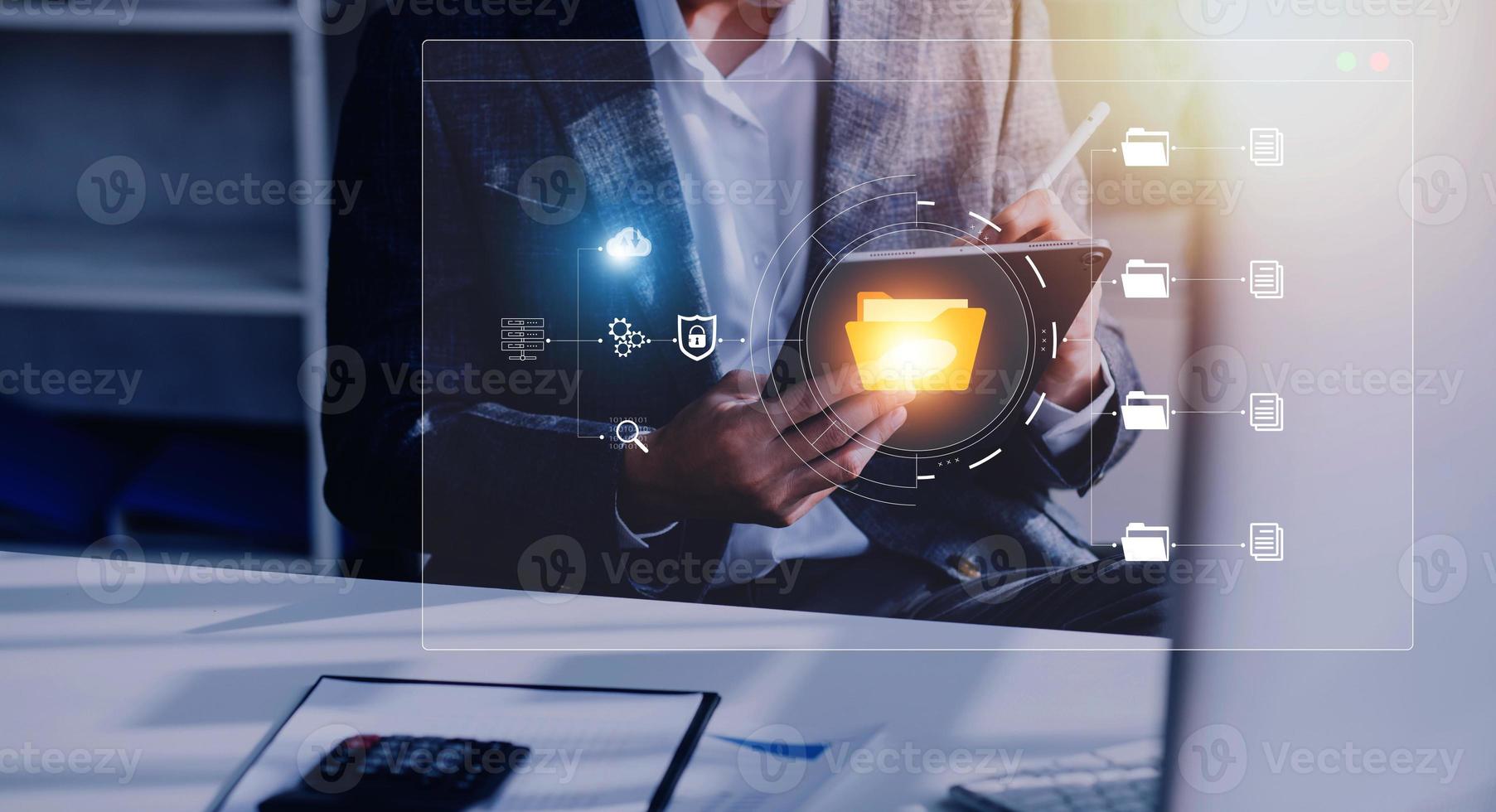 Document management system concept, business man holding folder and document icon software, searching and managing files online document database, for efficient archiving and company data. photo