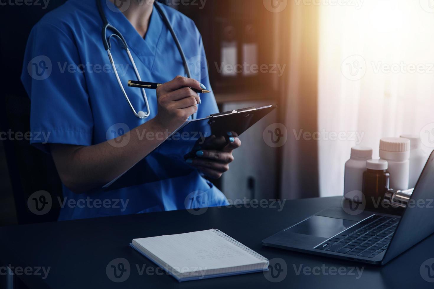 Medicine doctor working with digital medical interface icons on the hospital background, healthcare and Medical technology and network concept. photo