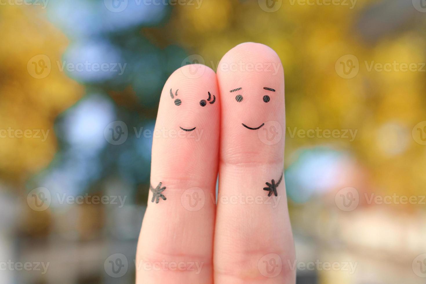 Fingers art of happy family.  The concept of a walk in the autumn park. photo