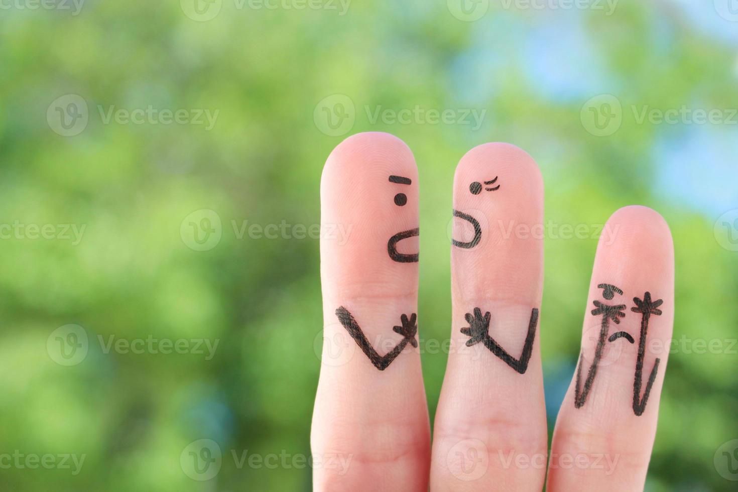 Fingers art of family during quarrel. Concept of parents quarrel, child was upset. photo