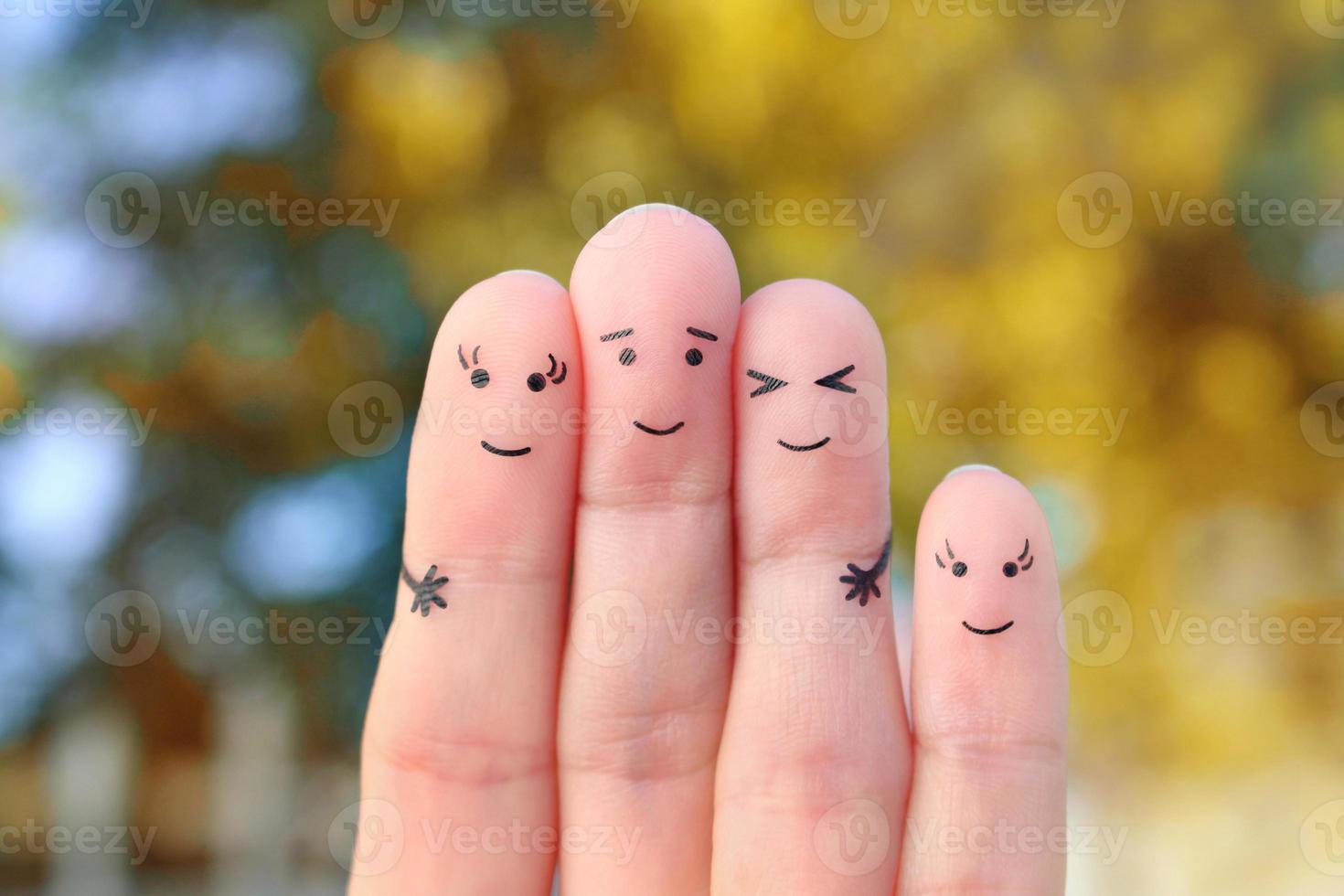 Fingers art of happy family.  The concept of a walk in the autumn park. photo