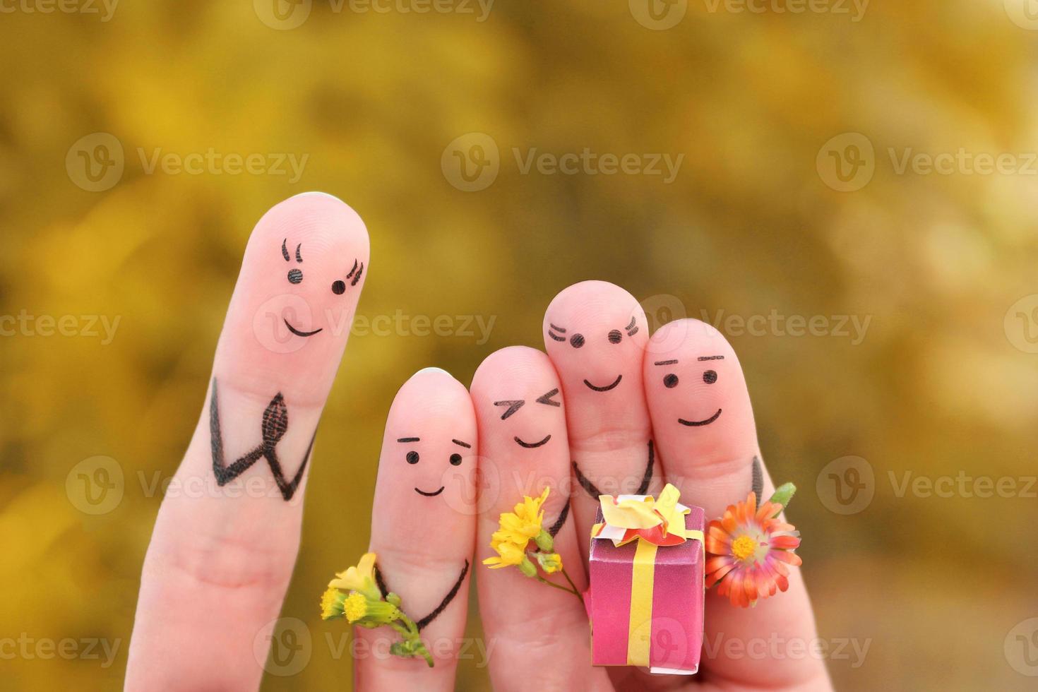 Fingers art of happy people. Concept schoolchildren give flowers to the teacher. Mother's Day. Knowledge Day. September 1. Teacher's Day. photo