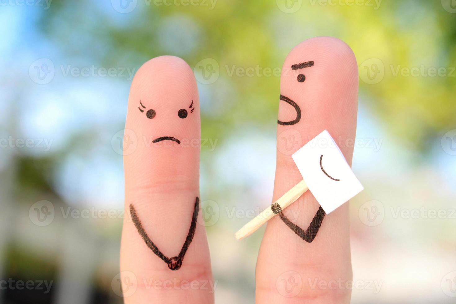 Fingers art of family during quarrel. Concept of people hiding emotions. Husband shouts on wife. photo