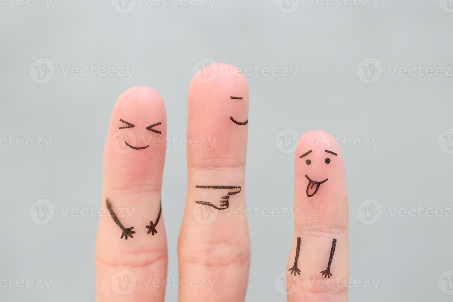 Fingers art of happy family. Concept of child makes face and parents laugh. photo