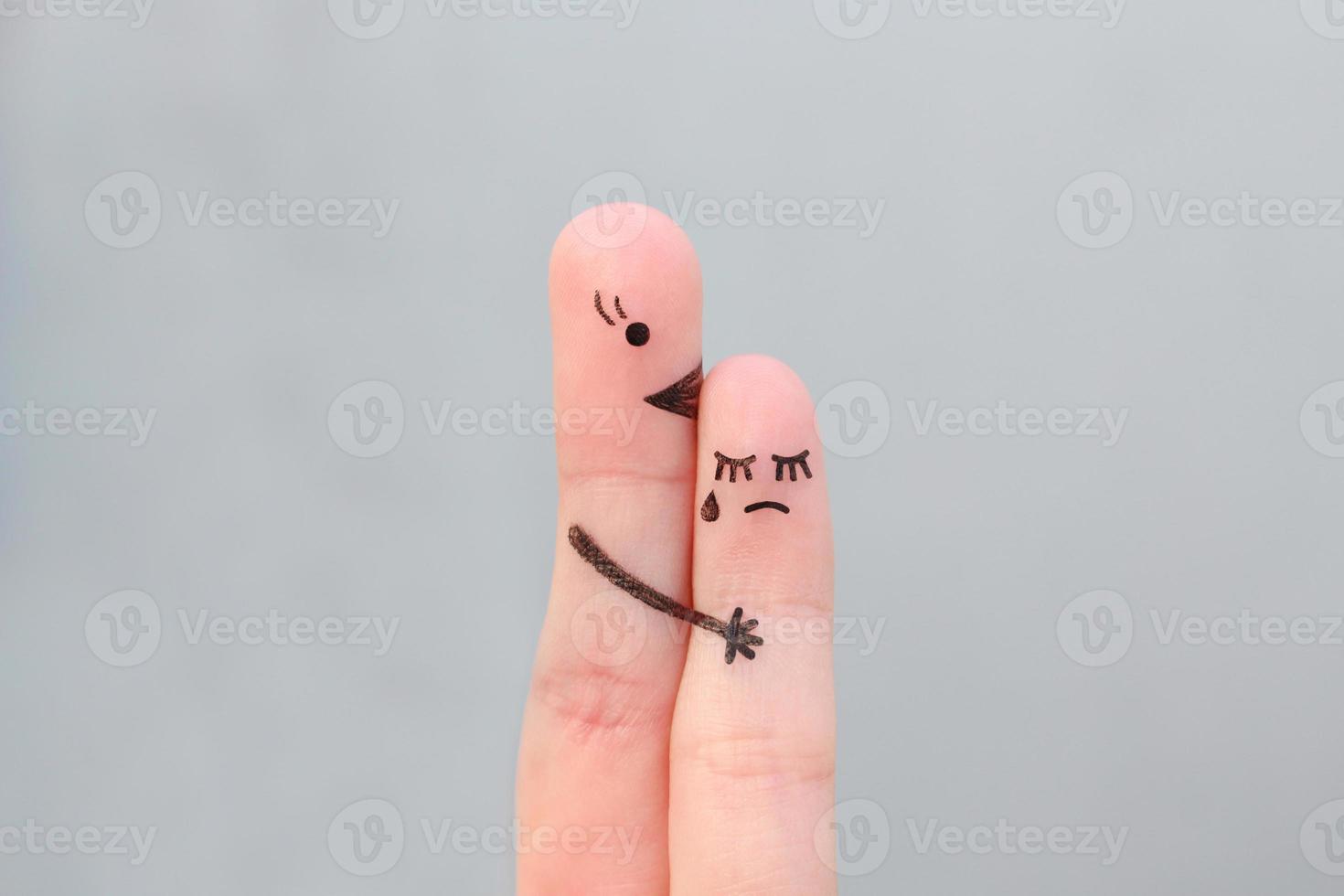 Fingers art of people. Child cries, mother reassures his. photo