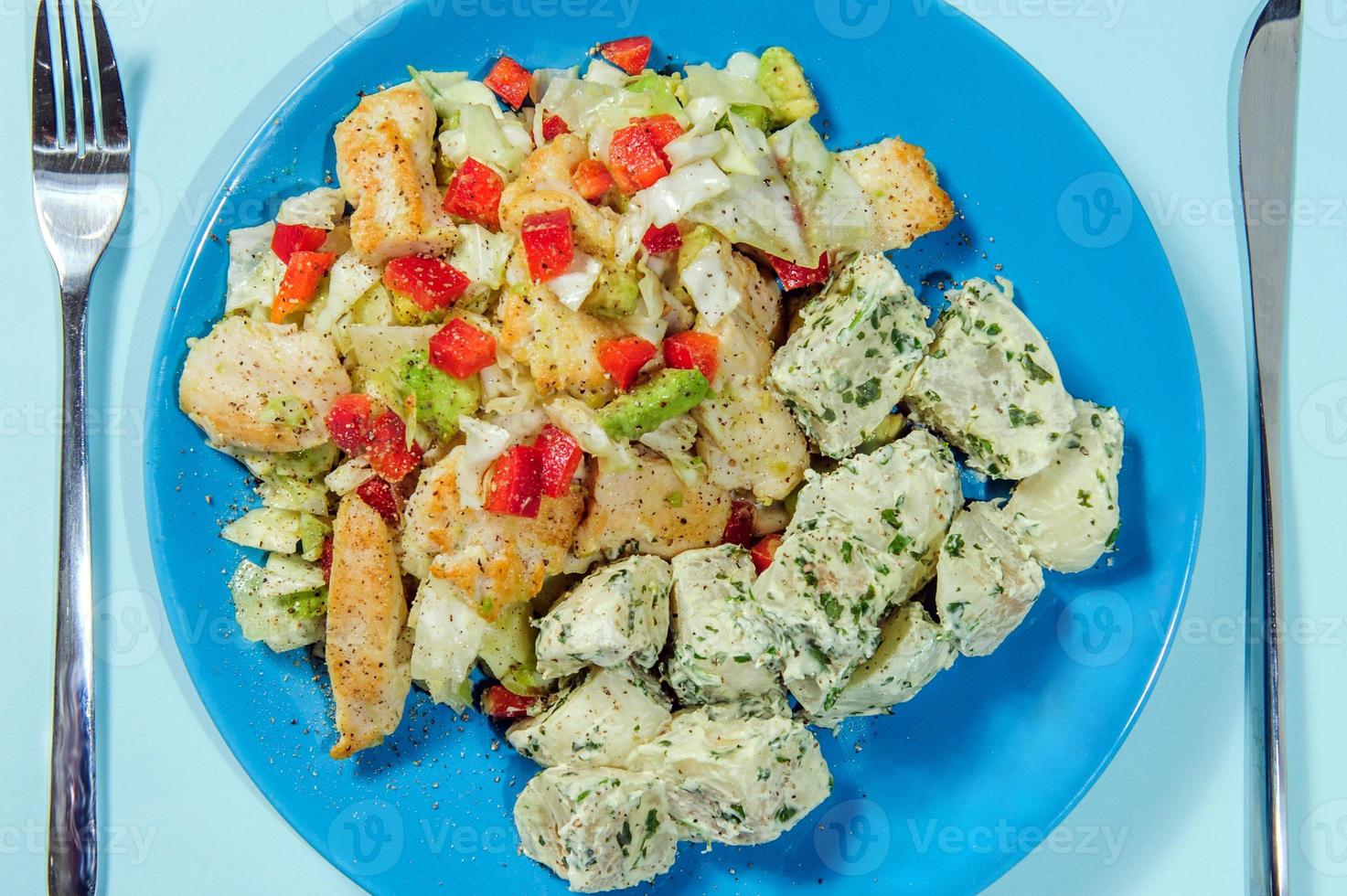 Fried potatoes with bacon and green onion on wooden background, top view. photo