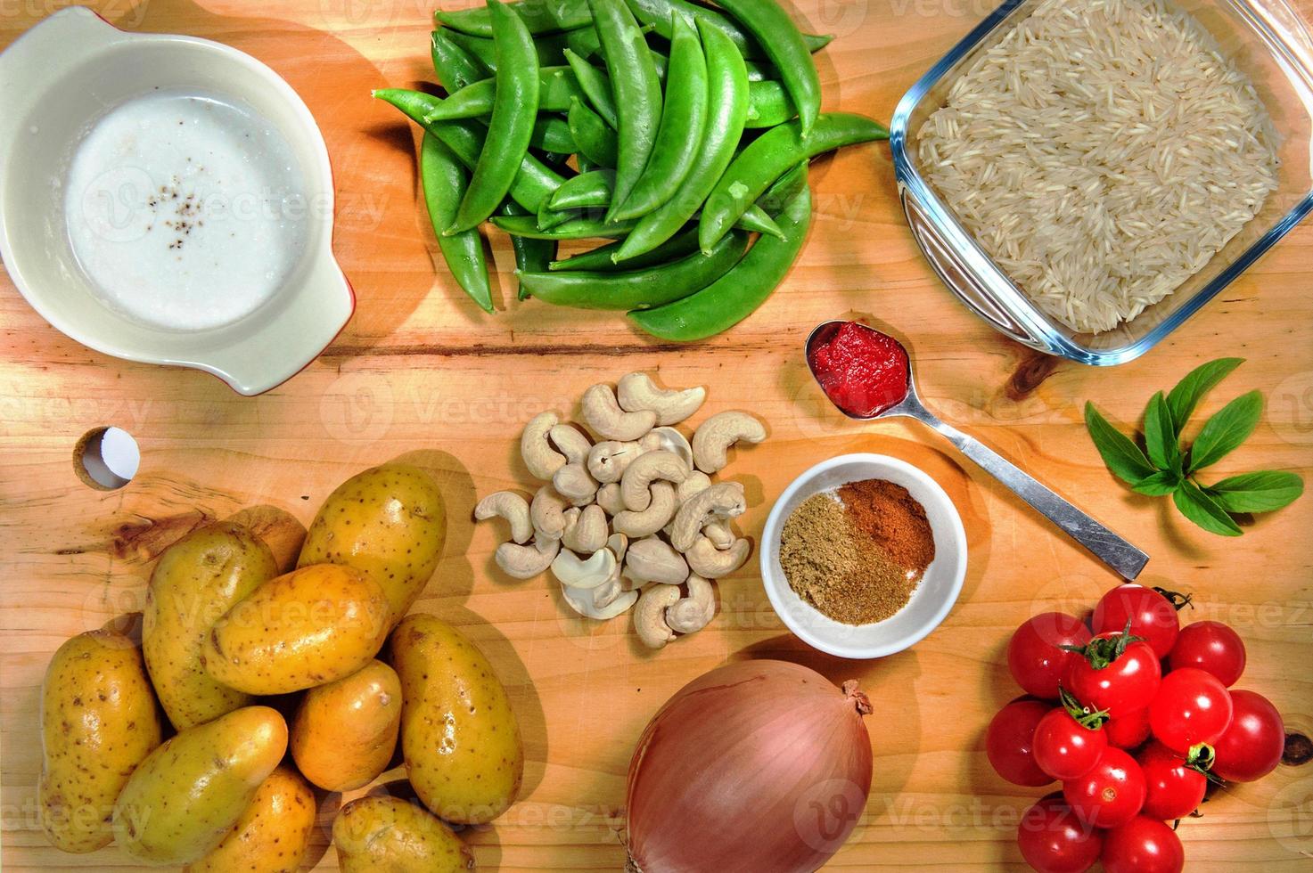 Raw ingredients. Ready to be cooked. Recipe for chiken stew, European cuisine, cooked with a garnish of mushrooms, small onions and ohter. photo