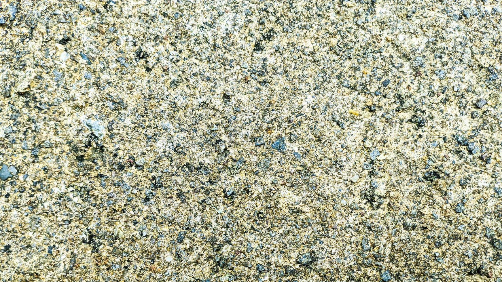 gravel floor with rough beige color surface photo