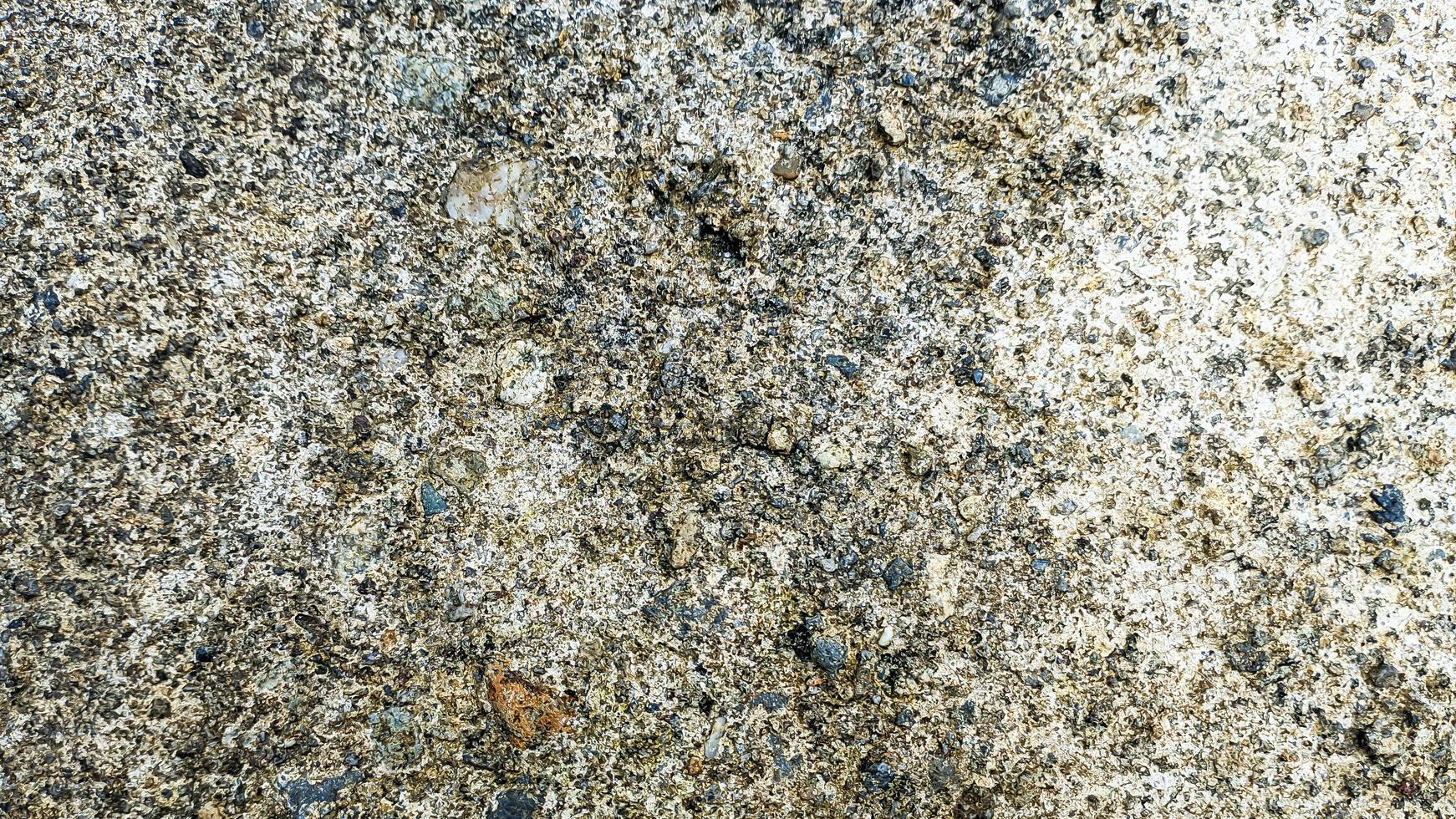 gravel floor with rough gray color surface photo