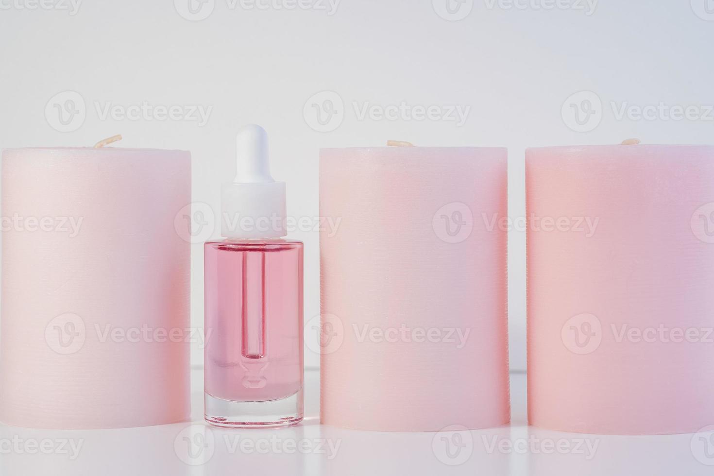 pink face oil and candles photo