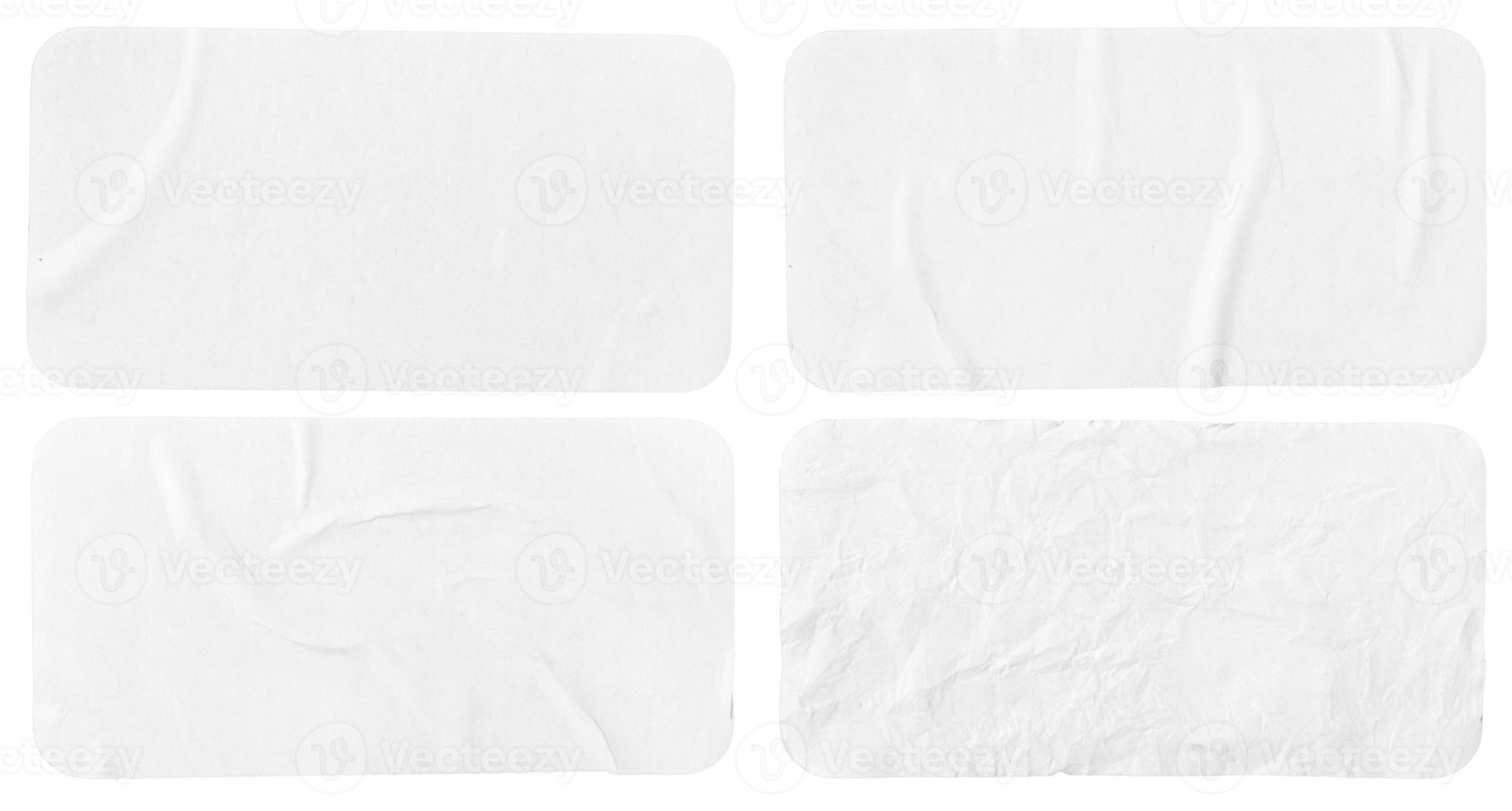 Set of four crumpled paper sheets, each of which is isolated on white background. Rectangle shape has rounded edges. Template mockup photo