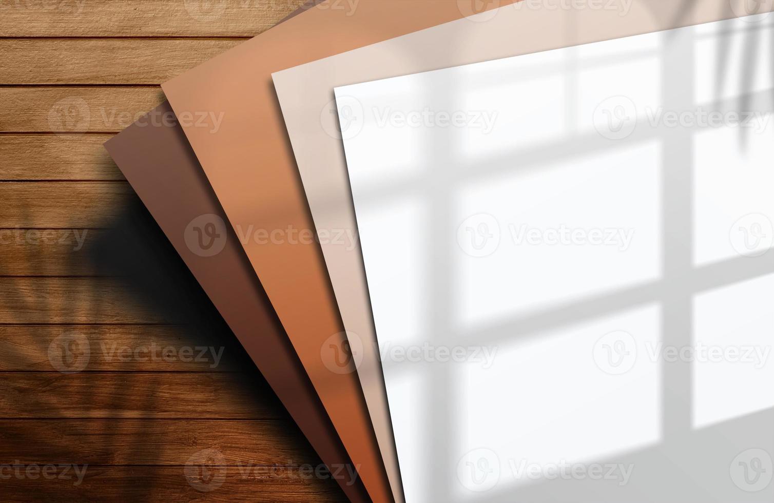 illustration Logo sheet mockup. A square paper mockup with realistic shades of brown paper on a wooden background. shade tropical plants. Template, flyer, blank advertisement poster for social media photo