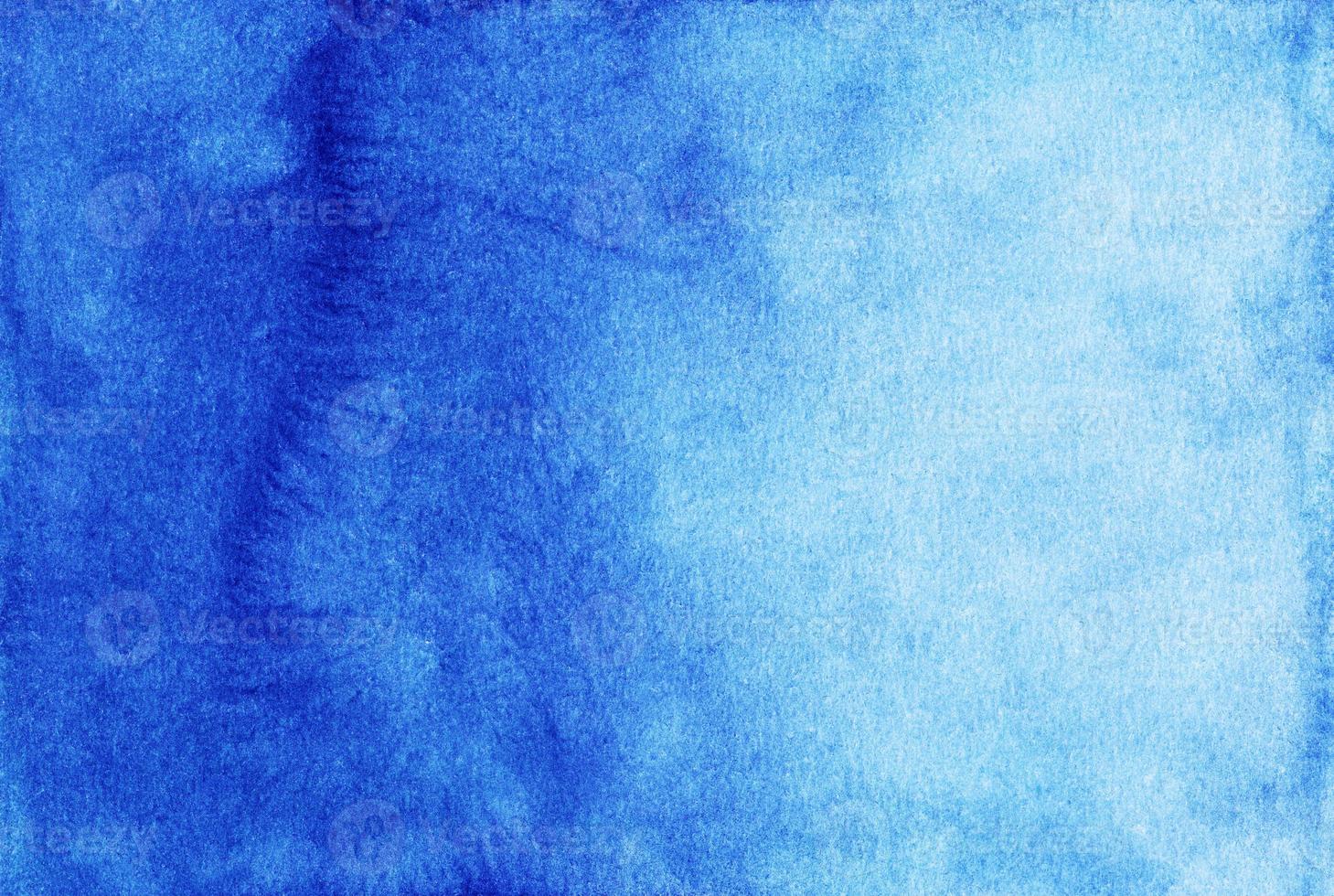 Watercolor deep blue gradient background. Hand painted calm watercolour backdrop. Stains on paper. photo