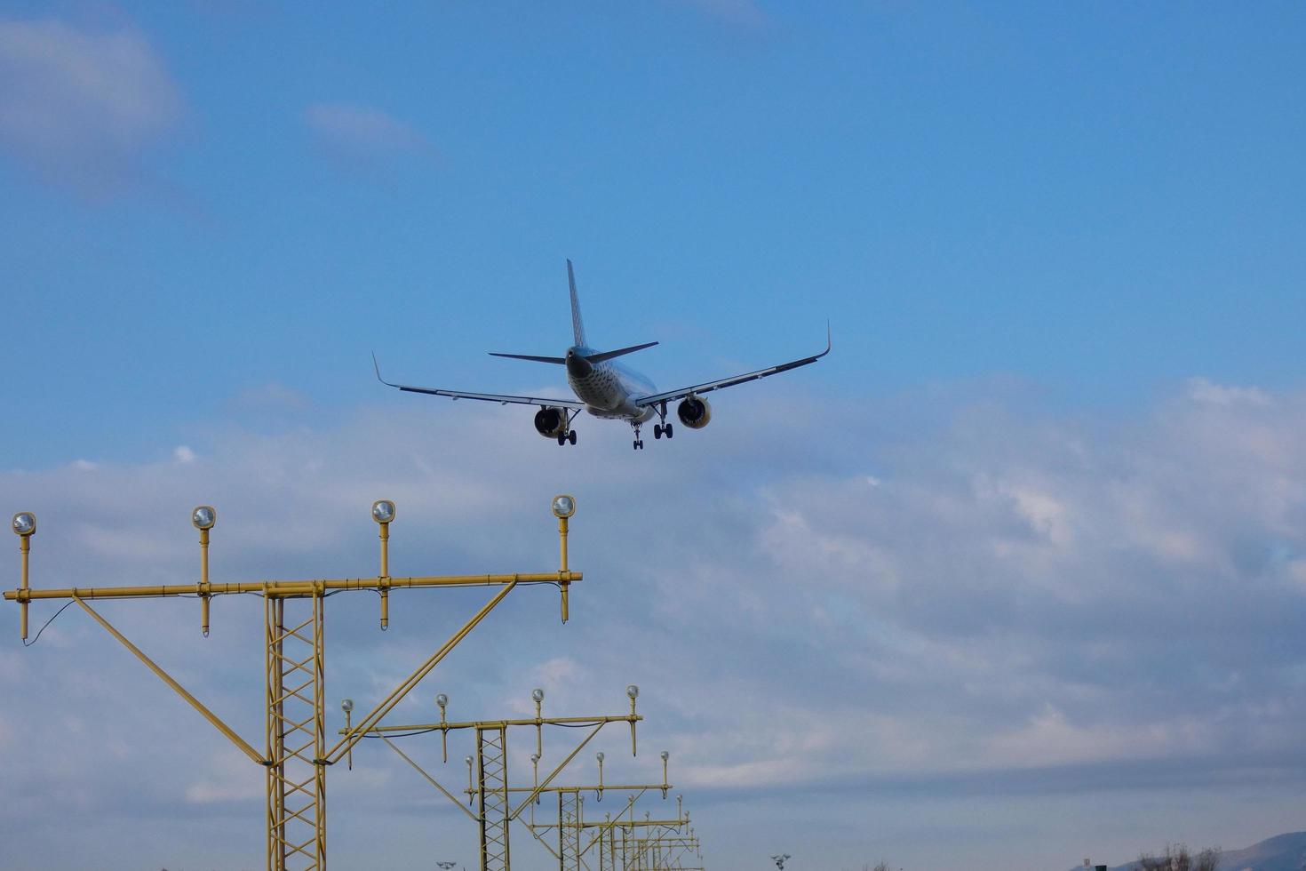 commercial airplane entrance to an airport, airport entrance signs, airport entrance lights photo