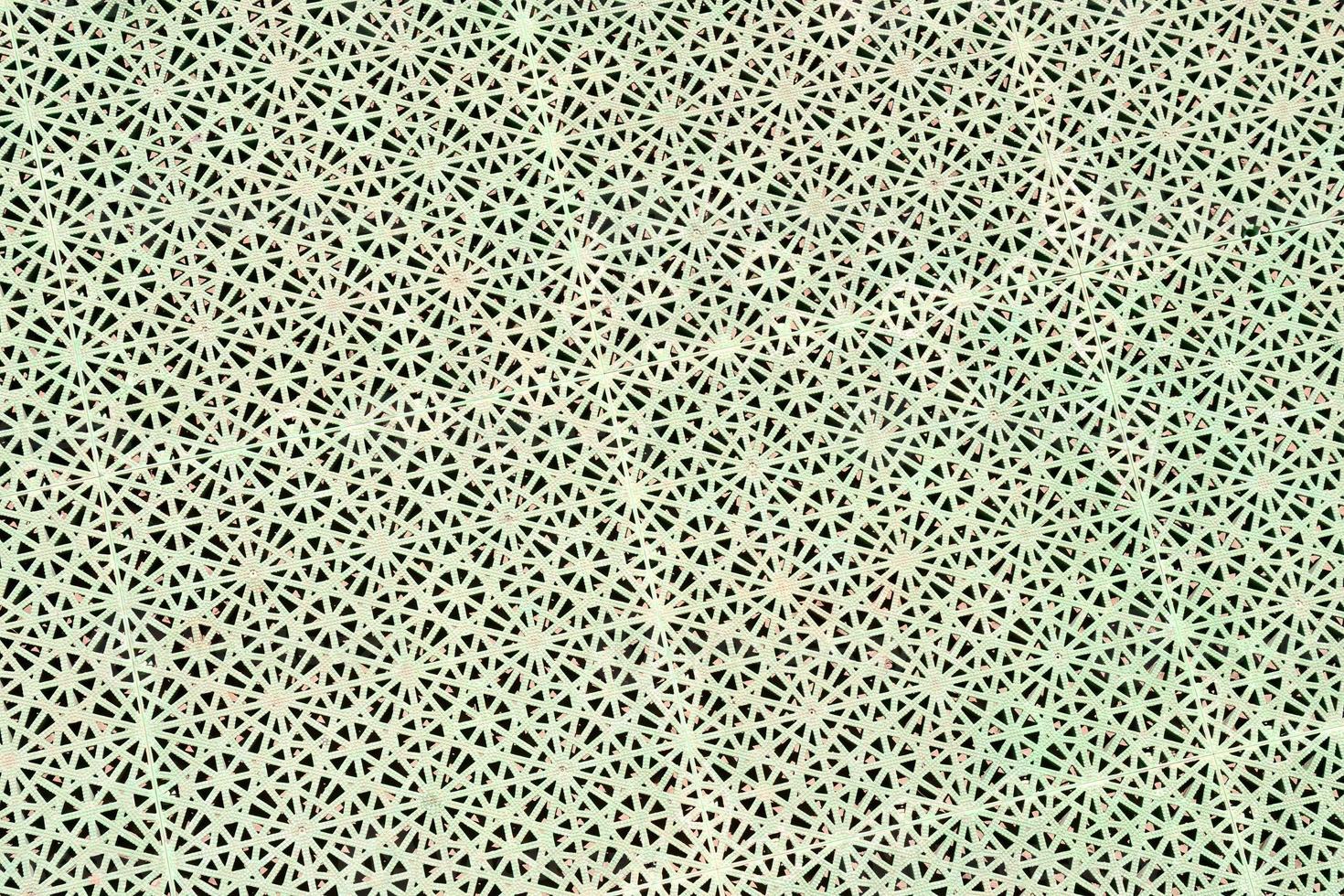 Green metal structure with patterns photo