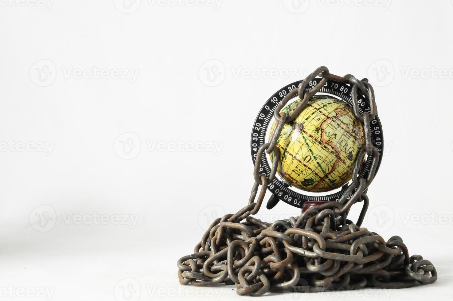 Globe with chains photo