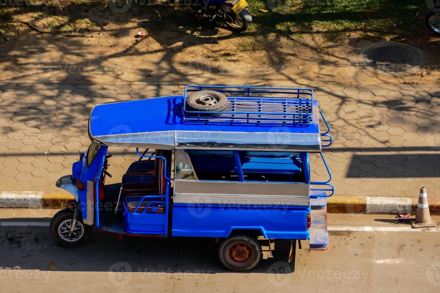 Rickshaw on the road - Laos 2022 photo