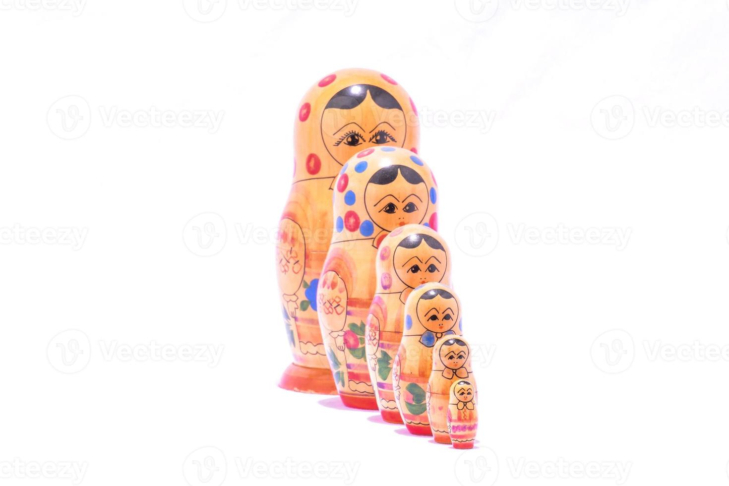 Matrioska dolls on white background photo