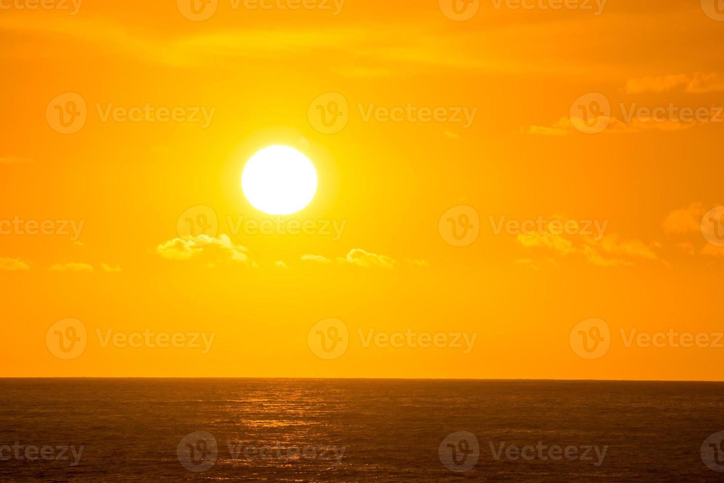 Sunset over the sea photo