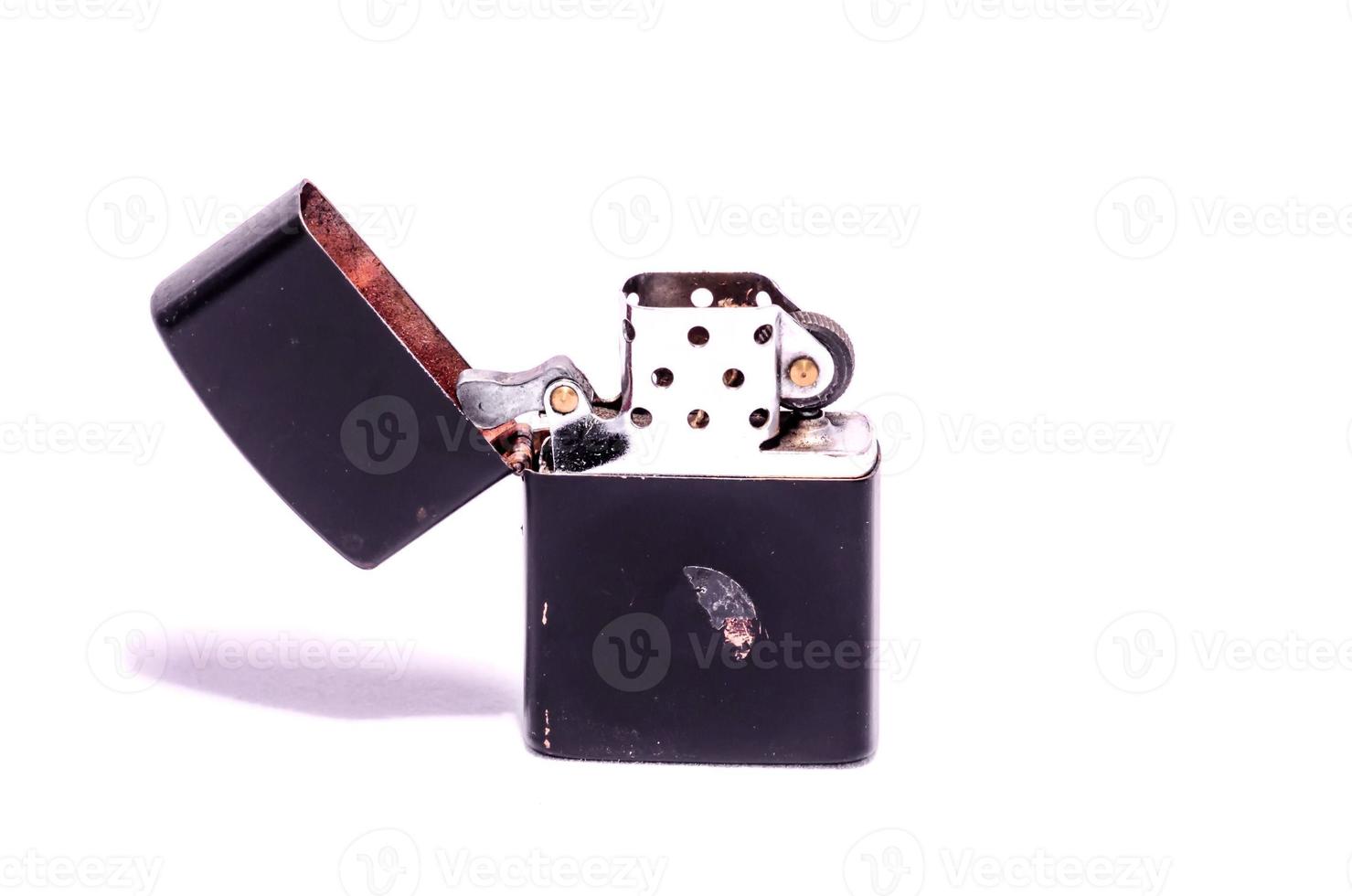 Flip lighter on light background photo