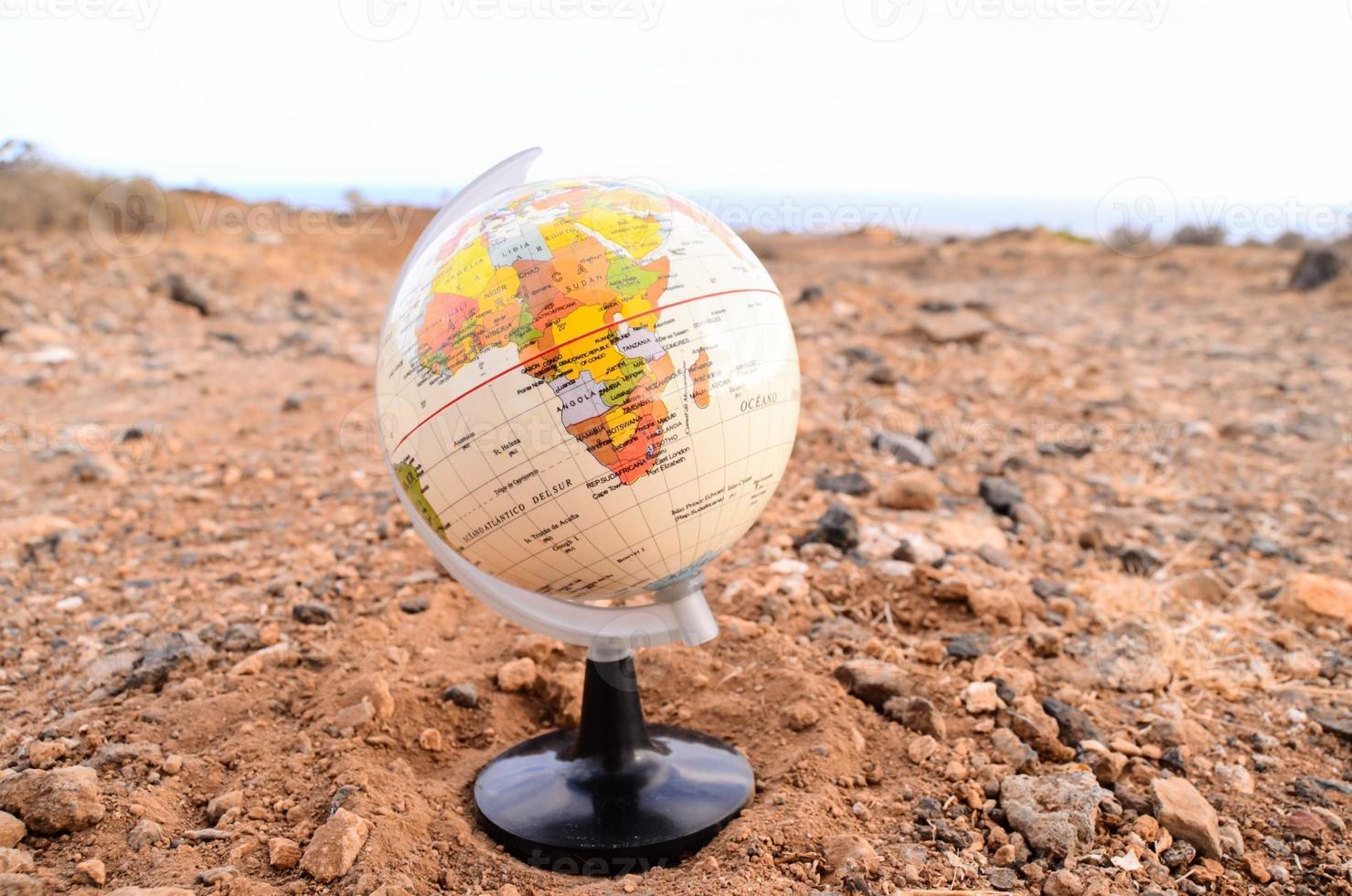 Globe in the gravel photo