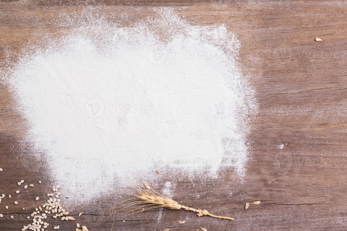 white podder bomb The distribution of flour on table wood  background - top view photo