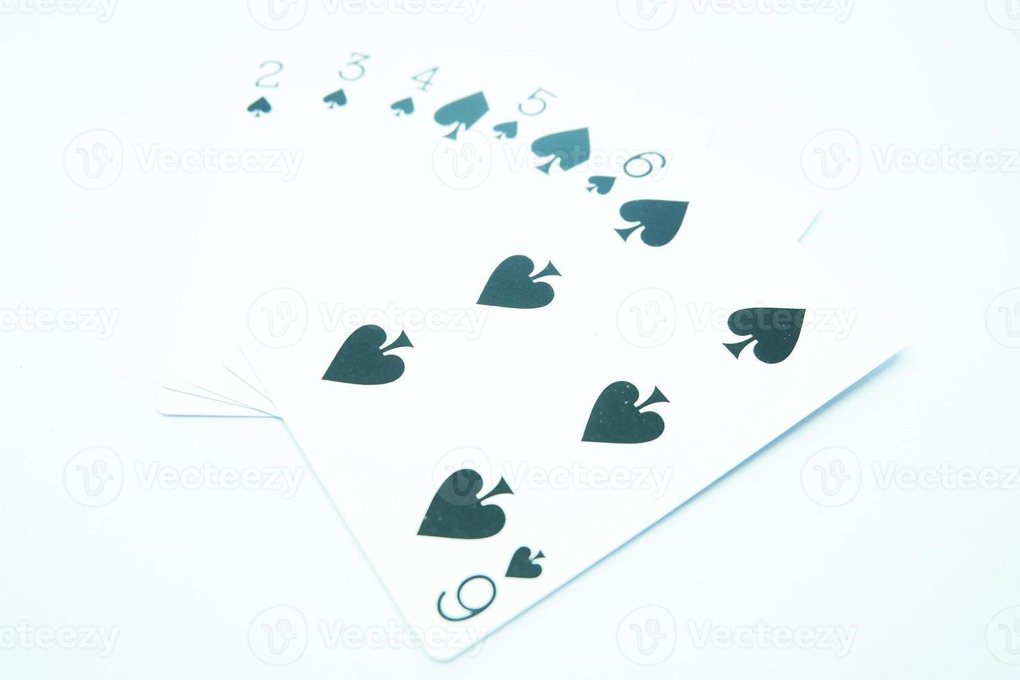 Spade Straight Flush Any sequence all the same suit, for instance 6-5-4-3-2 in white background photo