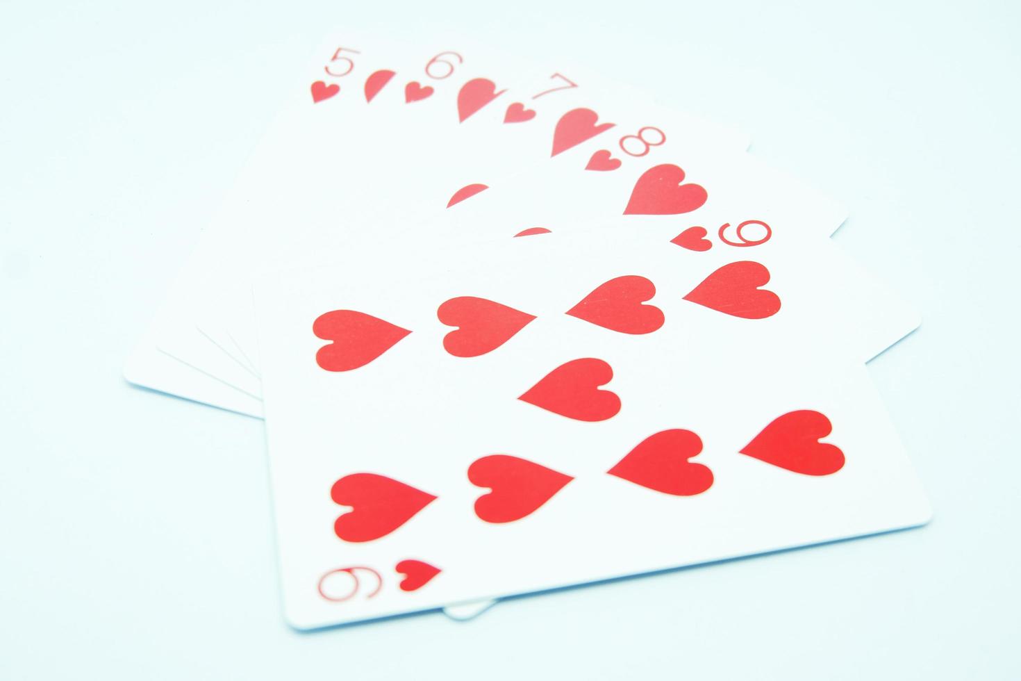 Heart Straight Flush Any sequence all the same suit, for instance 9-8-7-6-5 in white background photo