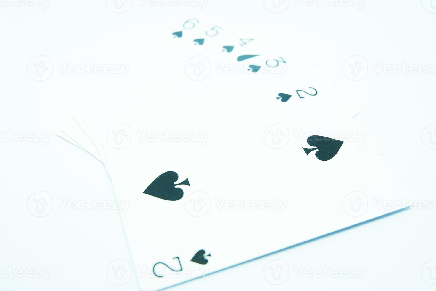 Straight Flush of Spade  Any sequence all the same suit, for instance 6-5-4-3-2 in white background photo