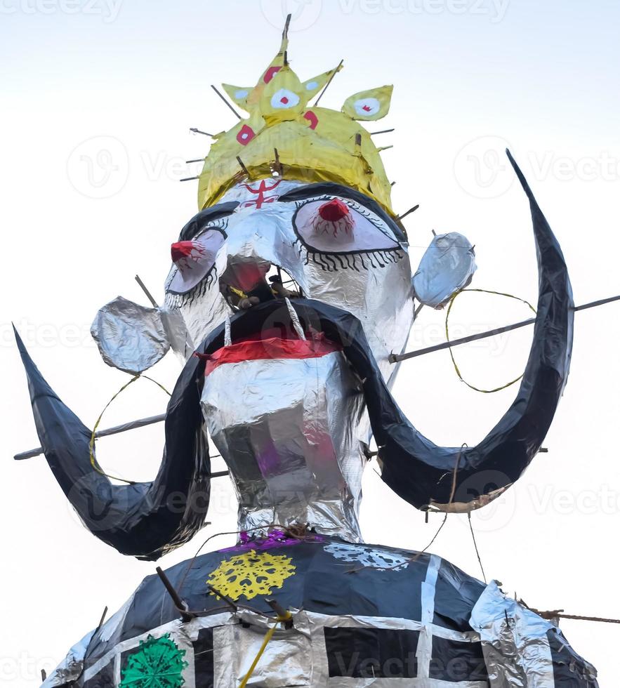 Ravnans being ignited during Dussera festival at ramleela ground in Delhi, India, Big statue of Ravana to get fire during the Fair of Dussera to celebrate the victory of truth by Lord Rama photo