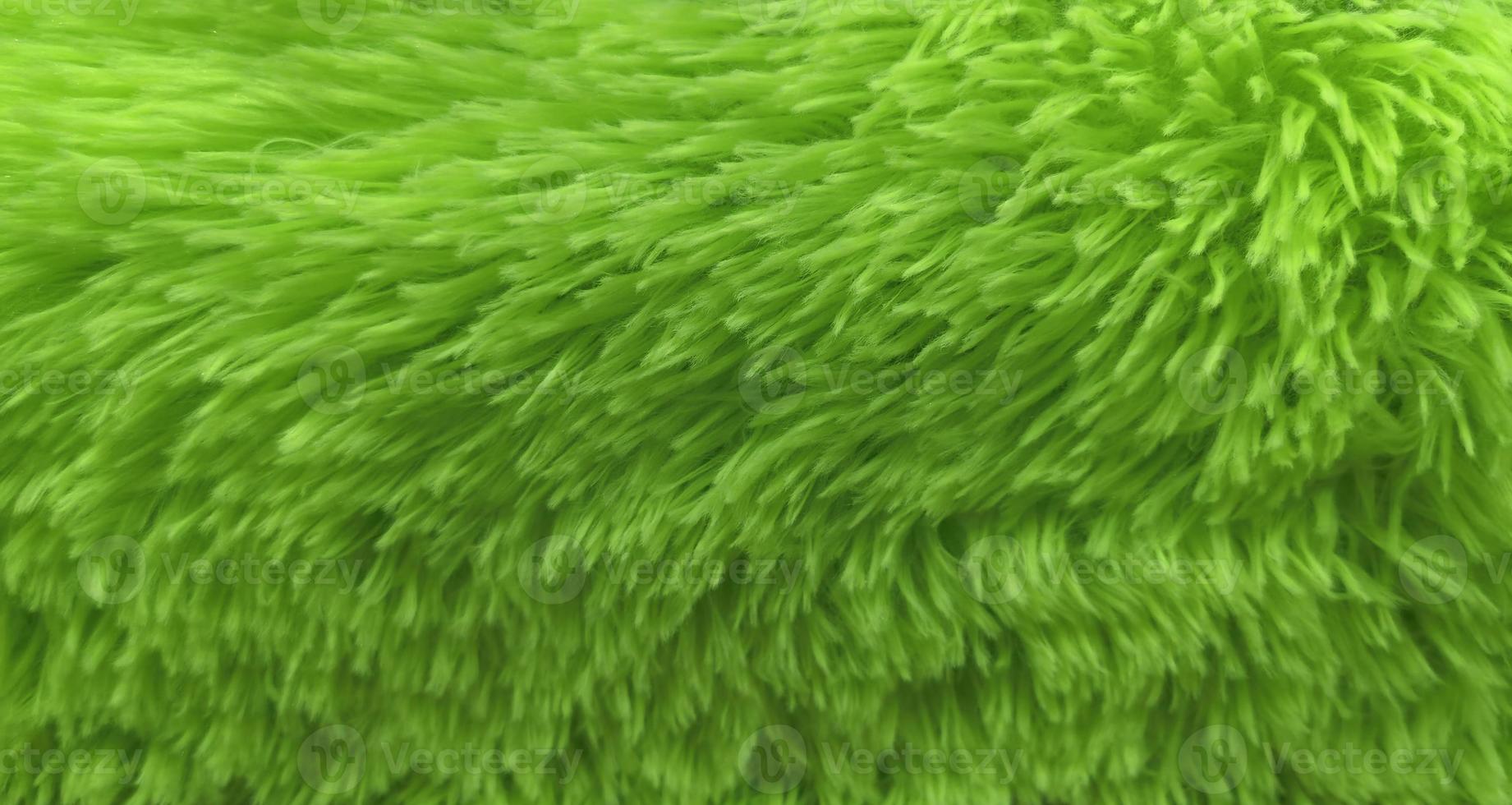 top view of fur Fur pattern background. Texture of shag. Wool texture. Imitation fur close-up. photo