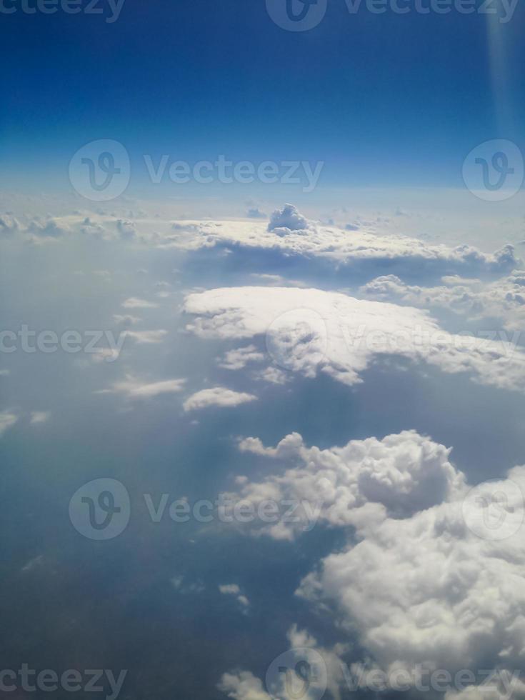 Blue sky with clouds background photo