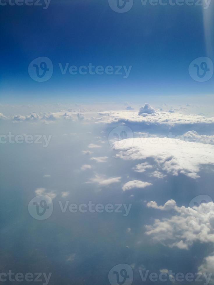 Blue sky with clouds background photo