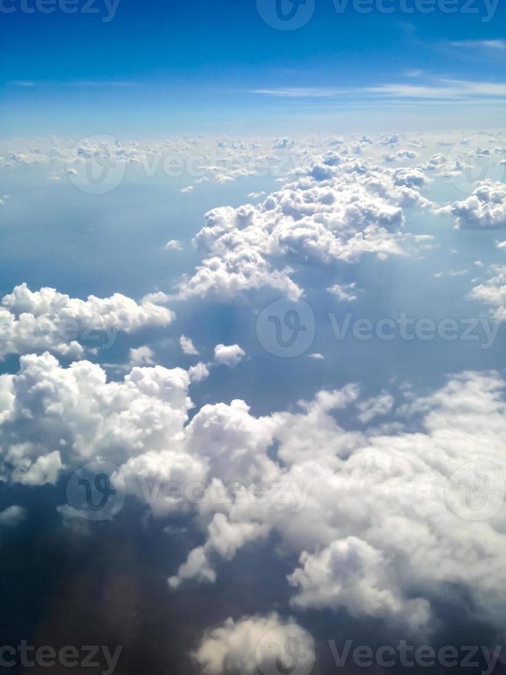 Blue sky with clouds background photo