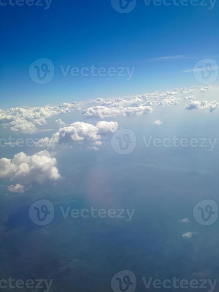 Blue sky with clouds background photo