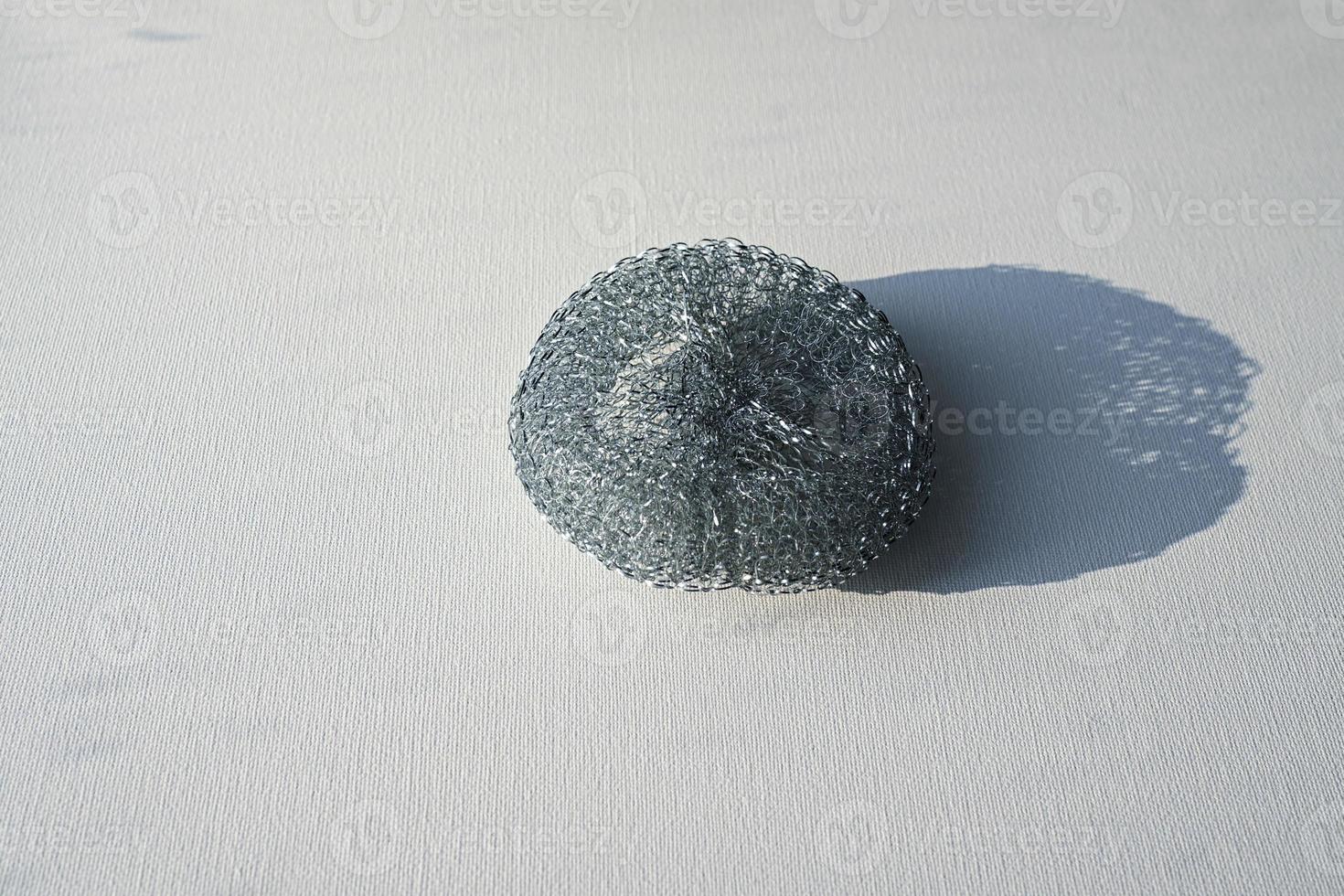Sponge made of metal wire for washing dishes. 20803986 Stock Photo at