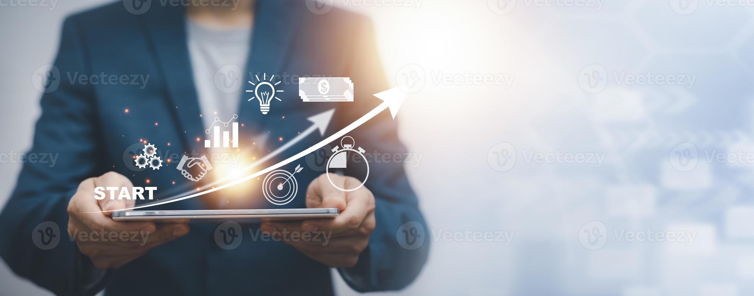 2022 and Startup concept with icon business and network connection on modern virtual interface from digital tablet.Businessman Touching tablet and graph Screen Icon of media screen, Technology Process photo