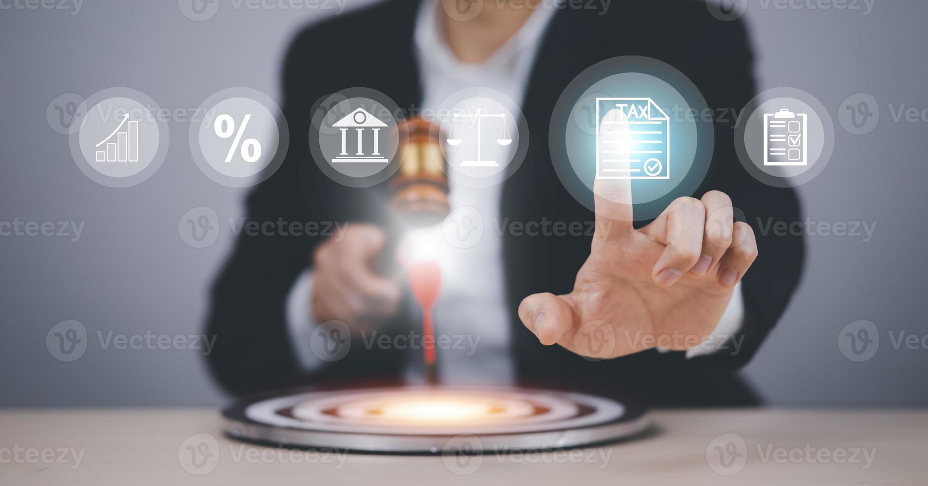 Tax concept, Businessman hand hold old wood Judge hammer touch red dart target dartboard, virtual globe and business icon and , Executive marketing, investment goal and target, photo