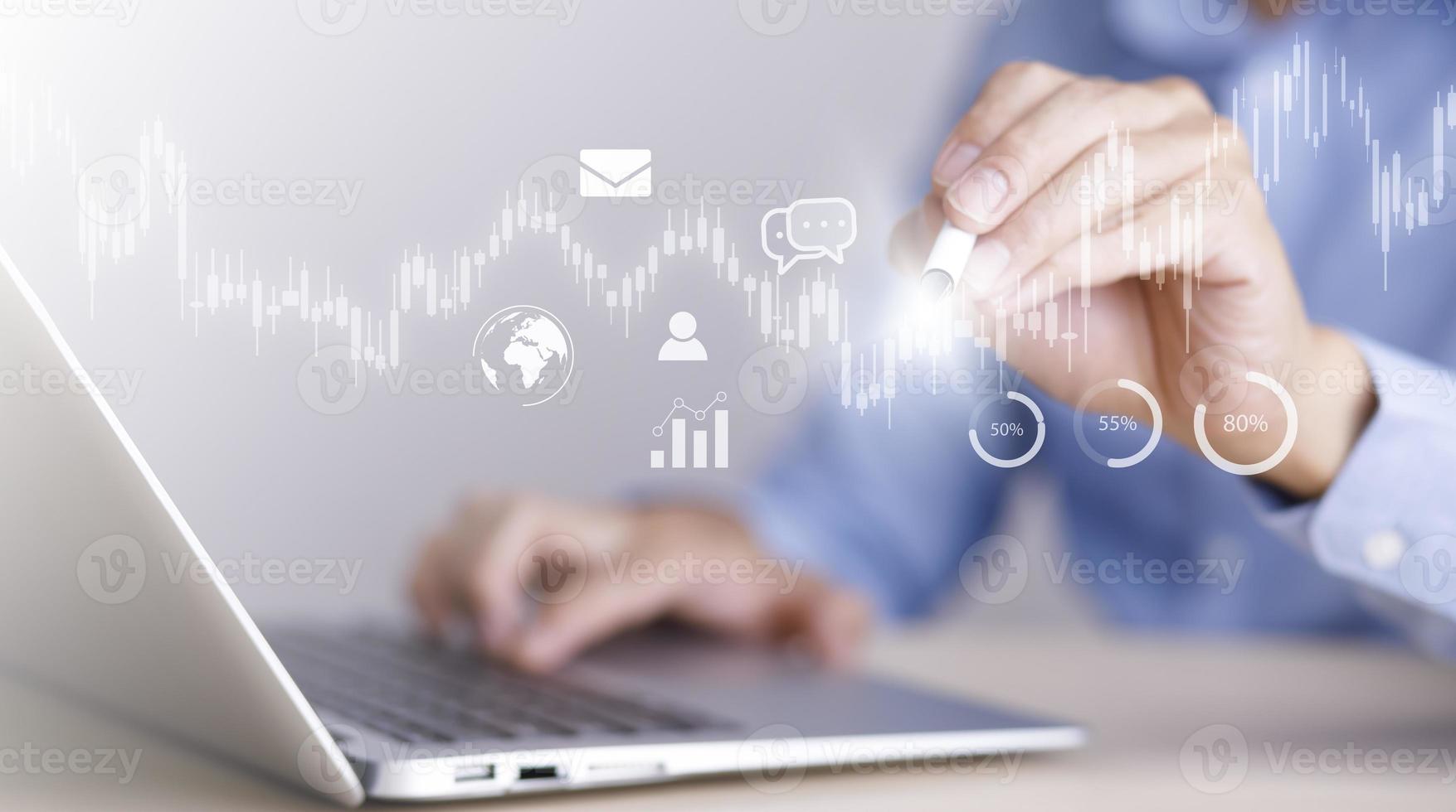 businessman hand type on the laptop of company profit with colleagues partner explain with virtual dashboard statistic chart stock infographic, graphs, cryptocurrency, and new trading platforms photo