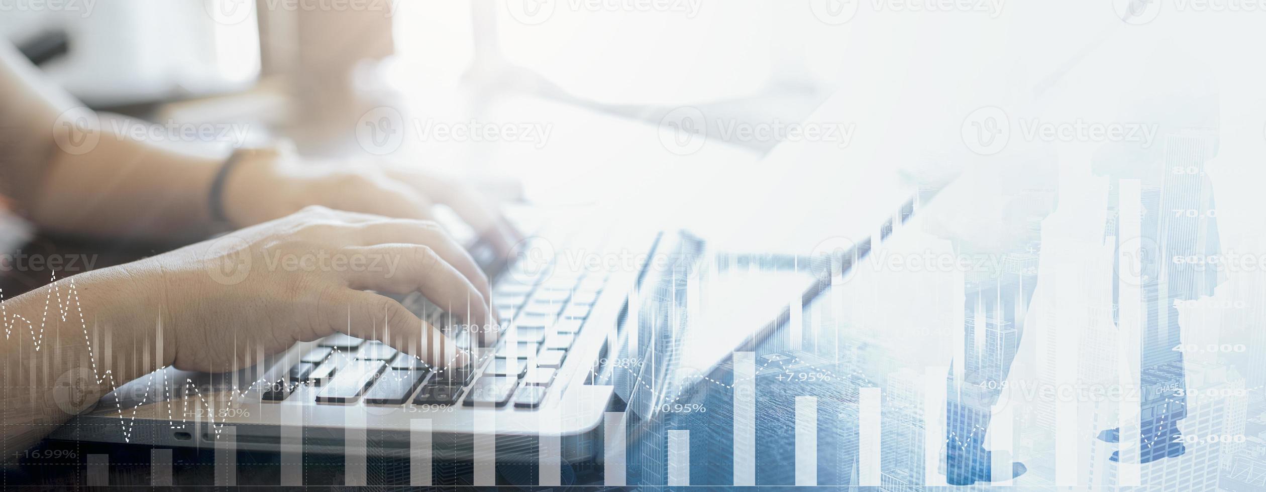 Businessman interacting with laptops, phones, and tablets with featuring stock tickers or graphs, cryptocurrency and new trading platforms, ideas and perspectives, Stock investment,New technology photo
