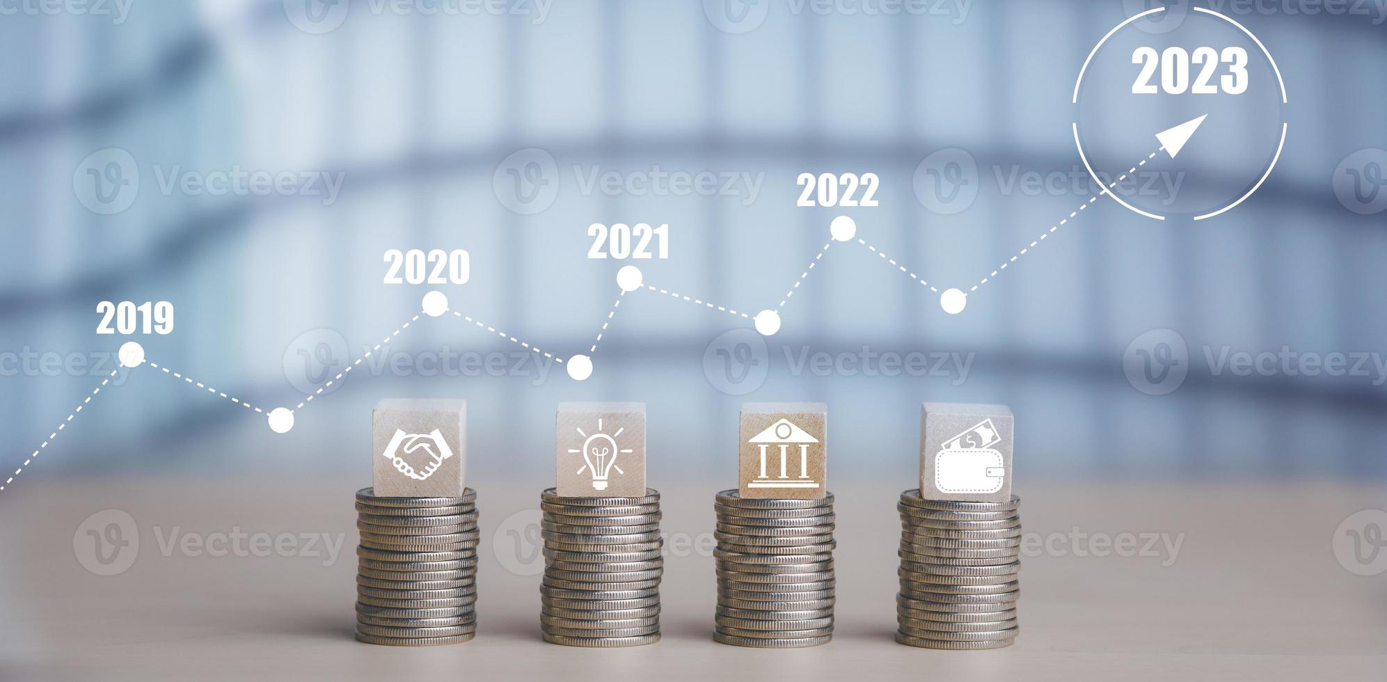 Double exposure of coins on the white background for finance and banking and Money spending planning, and investment budget, Business saving money concept, Copy space, new year 2022-2023 concept photo