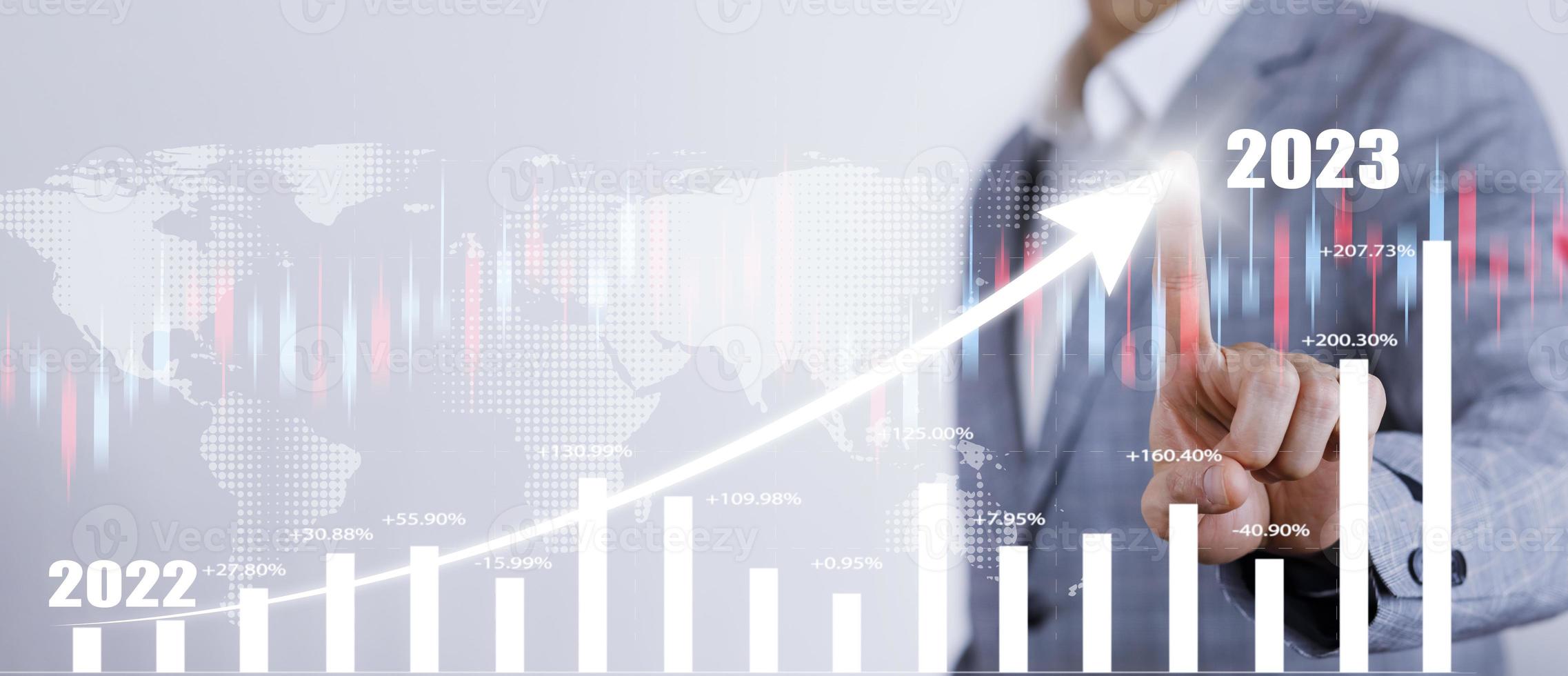 Business growth data chart arrow with diagram 2023 budget, Businessman pointing arrow graph corporate future growth year 2022 to 2023, Development to success and motivation. photo