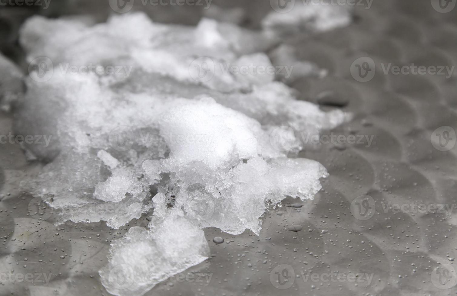 Metallic background with snow photo