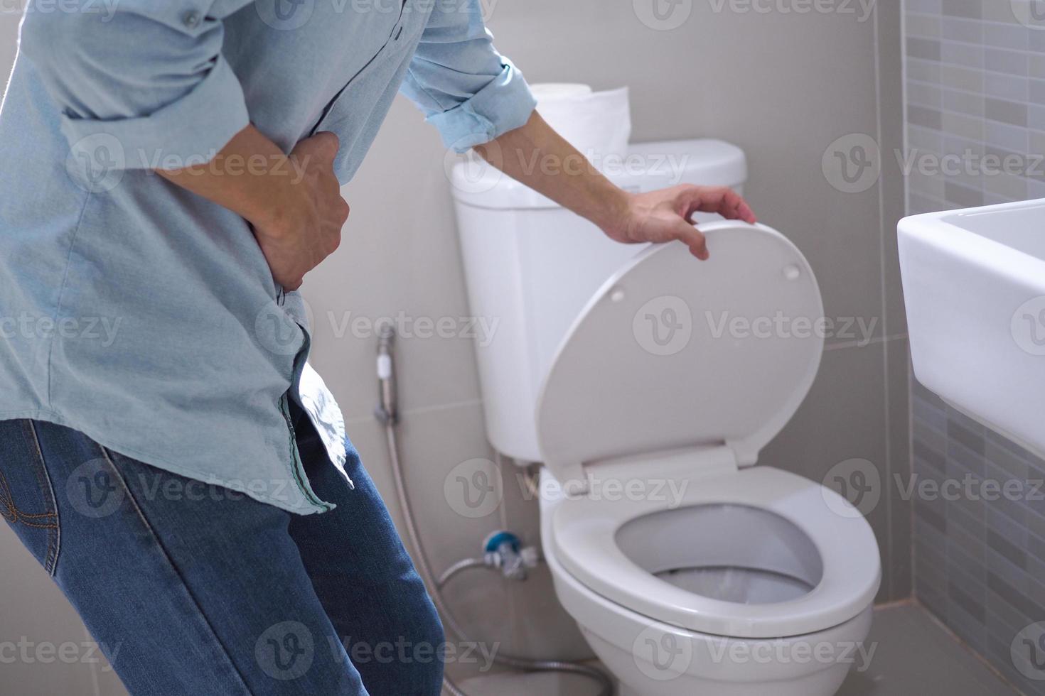 Men have abdominal pain. Want to shit. diarrhea concept photo